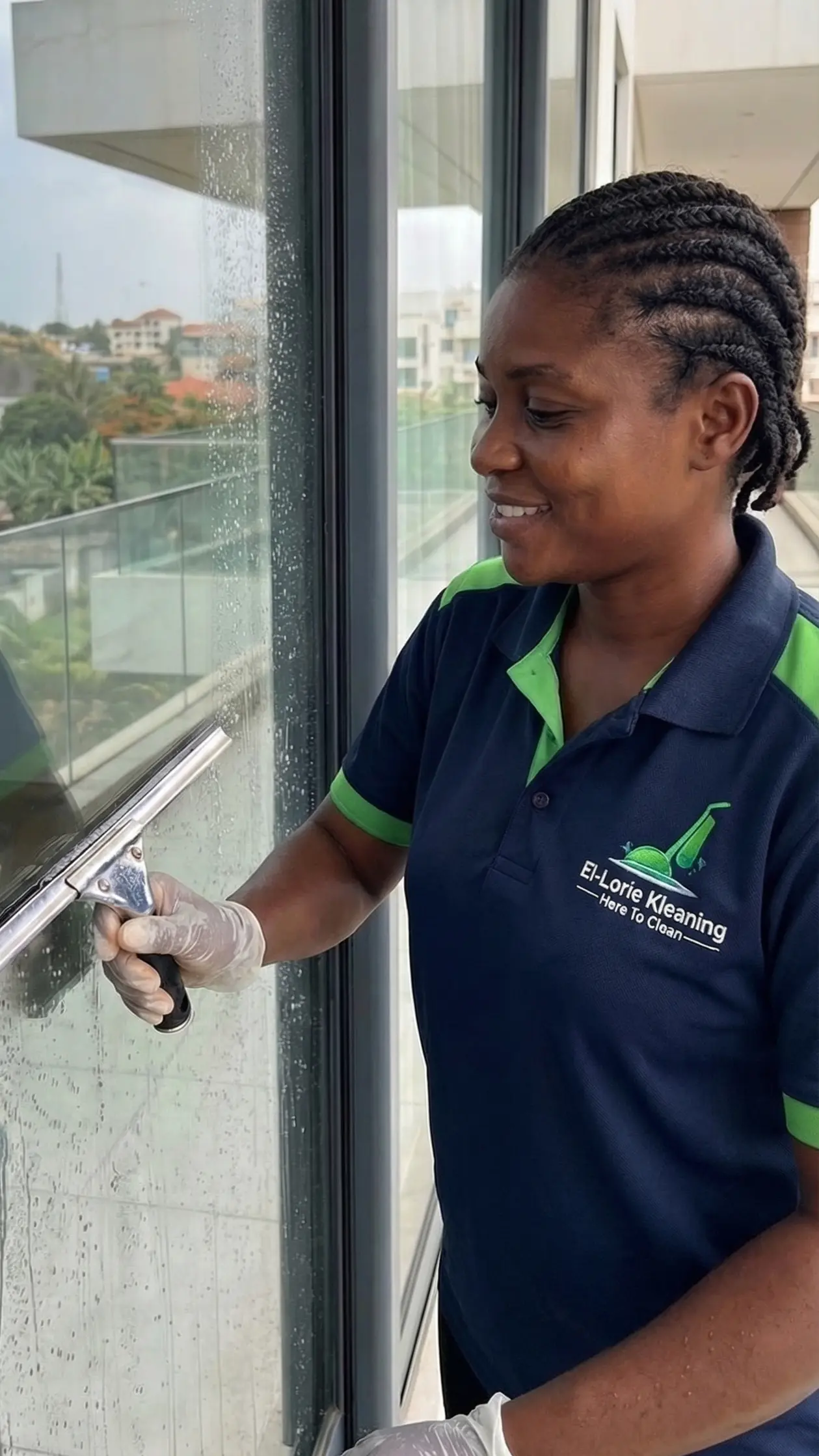 Woman cleaning windows